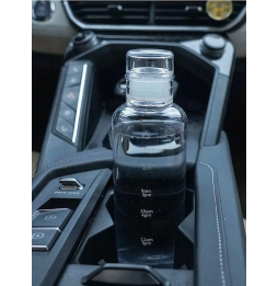 Botella de agua plástica transparente 750ml con horas marcadas